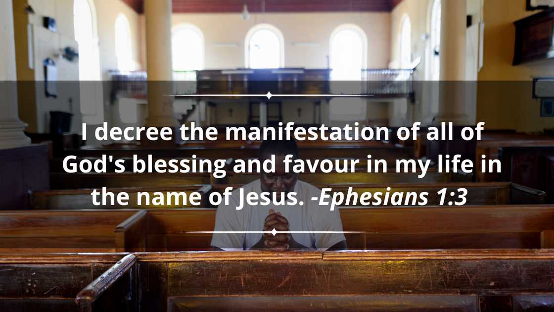 A worshipper in the Falmouth Parish Church of St. Peter the Apostle.