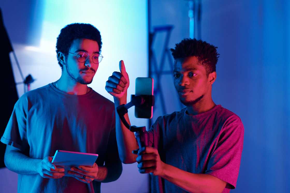 Two men filming a video Two men filming a video
