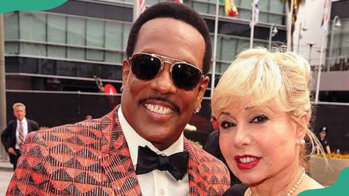 Charlie Wilson and Mahin Tat attend an event together Charlie Wilson and Mahin Tat attend an event together