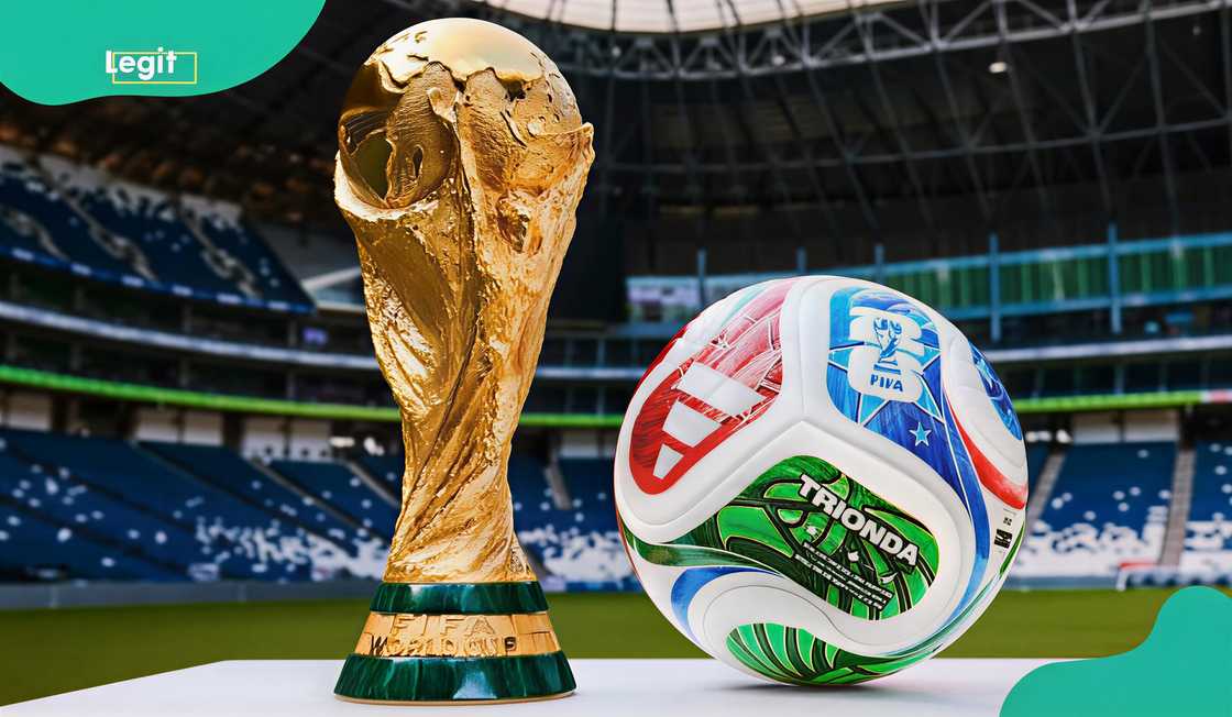 The World Cup trophy and the official match ball