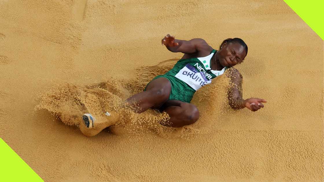 Ese Brume participating in the long jump at the Paris Olympics.