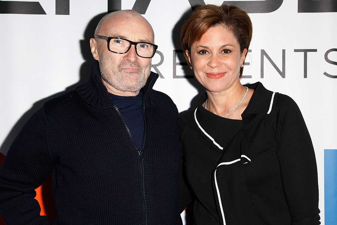 Phil Collins and Dana Tyler attending a game in 2013 Phil Collins and Dana Tyler attending a game in 2013