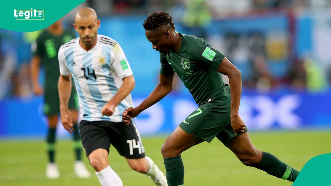 Ahmed Musa in action against Javier Mascherano.