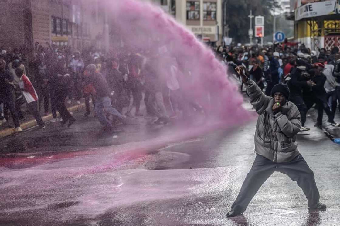 Protesters have been dodging clouds of tear gas and water cannon Protesters have been dodging clouds of tear gas and water cannon