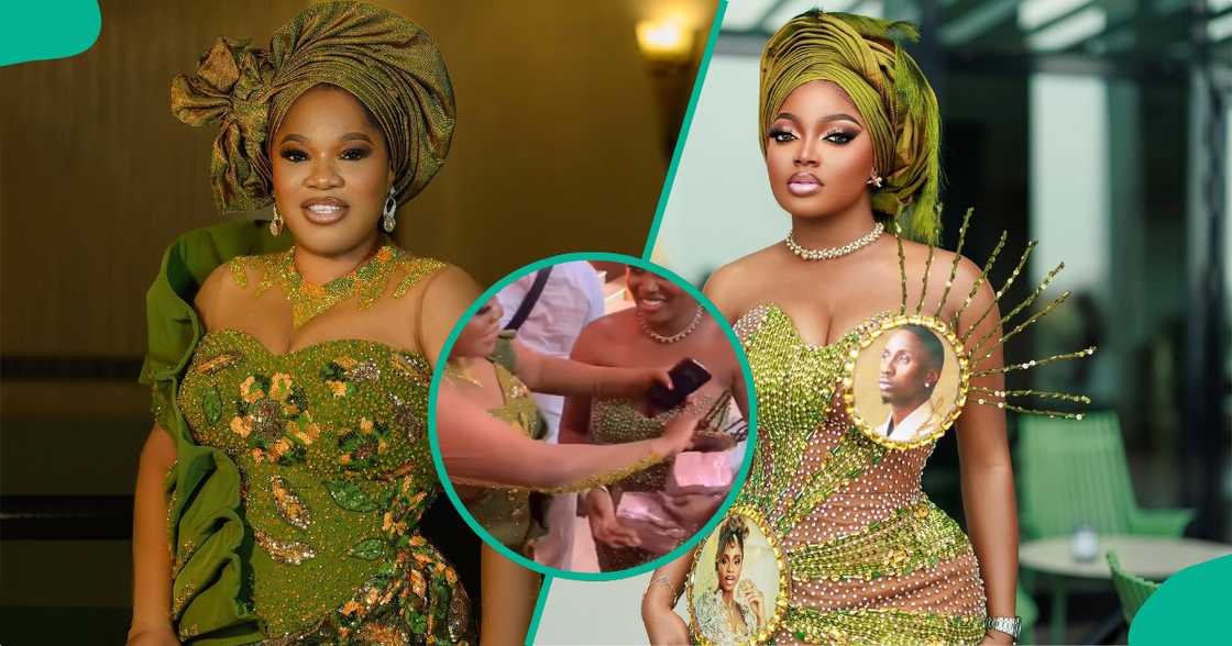 Toyin Abraham tried to take off Juma's pic from Papaya's dress. Toyin Abraham tried to take off Juma's pic from Papaya's dress.
