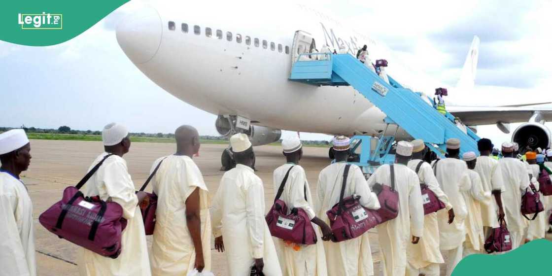 Pilgrims queue to board airplane to Saudi Arabia Pilgrims queue to board airplane to Saudi Arabia