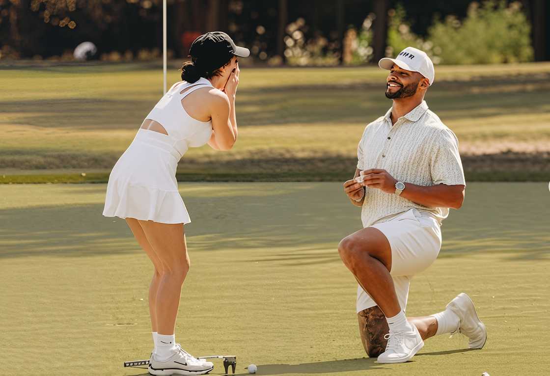 Dak Prescott (R) on bended knee proposing to his girlfriend Sarah Jane Ramos (R) on a golf course Dak Prescott (R) on bended knee proposing to his girlfriend Sarah Jane Ramos (R) on a golf course
