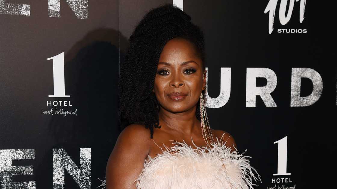 Actress Crystal R. Fox poses on the red carpet of the 2020 premiere of Burden at the Silver Screen Theatre Actress Crystal R. Fox poses on the red carpet of the 2020 premiere of Burden at the Silver Screen Theatre