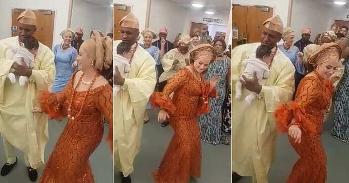 Oyinbo woman dances at naming ceremony