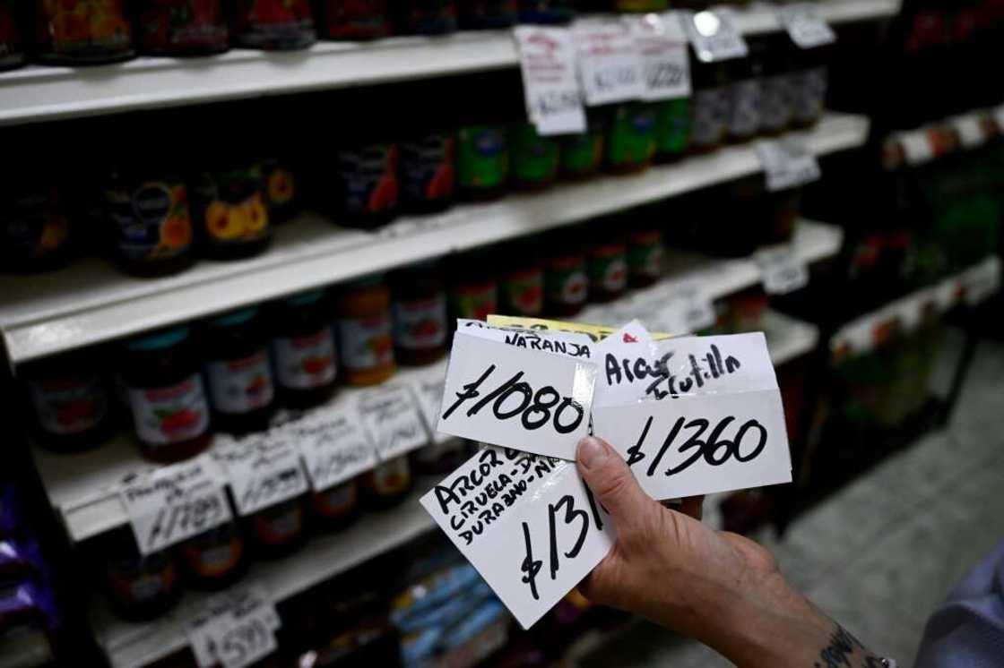 Annual inflation is already at 143 percent, and prices have risen further after the outgoing government this week eased price controls on basic goods Annual inflation is already at 143 percent, and prices have risen further after the outgoing government this week eased price controls on basic goods