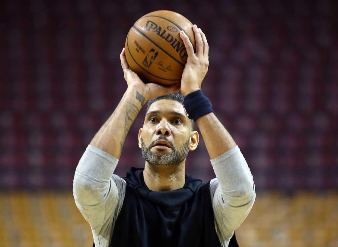 Tim Duncan shoots the ball during warm-up for an NBA game against the Toronto Raptors