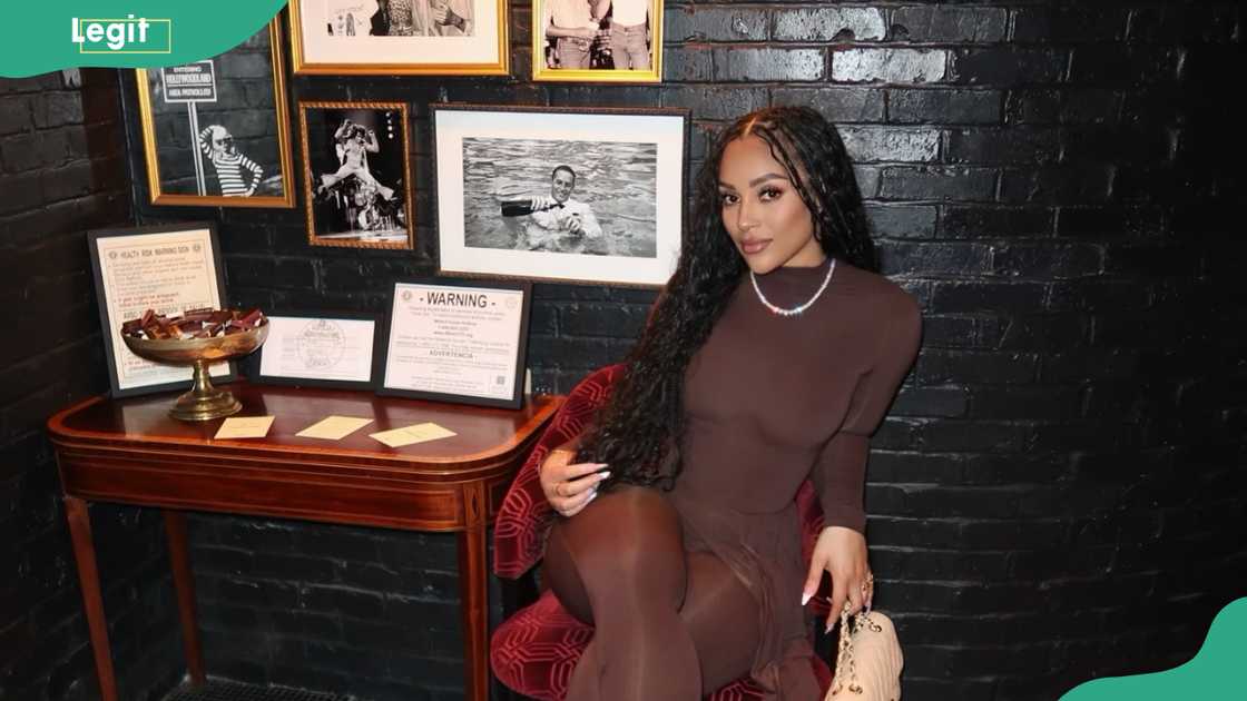 Joie Chavis in a gallery-style space with a stylish, upscale ambiance Joie Chavis in a gallery-style space with a stylish, upscale ambiance