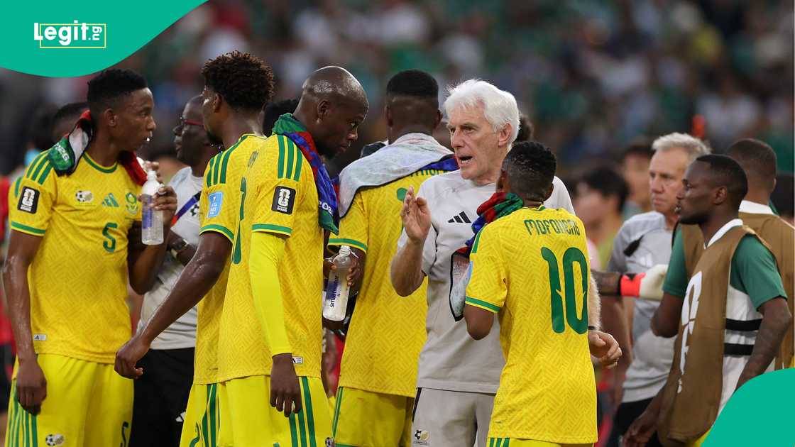 South Africa's Belgian head coach Hugo Broos talks to his players at the 2026 World Cup. Photo by Julio Cesar AGUILAR