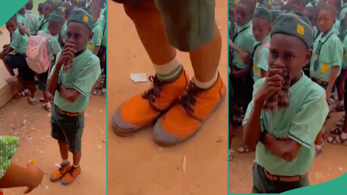 Lady shares video of school boy wearing NYSC shoes. Lady shares video of school boy wearing NYSC shoes.