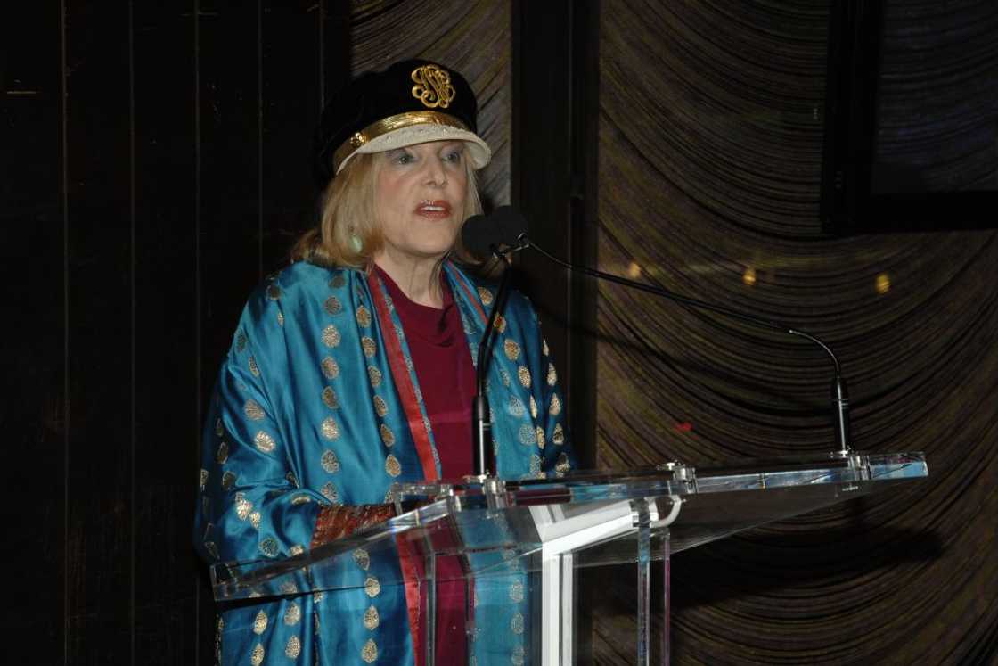 Gael Greene addresses an audience at a restaurant