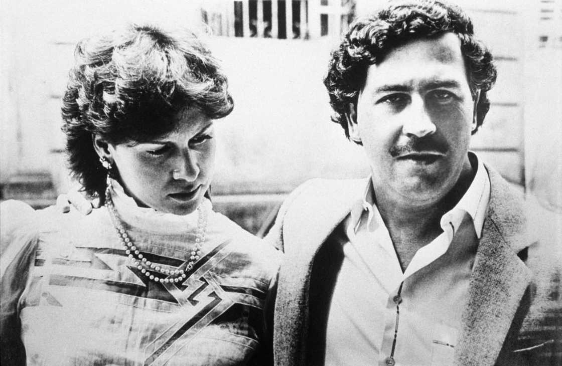 Pablo Escobar and his wife Maria Victoria sitting in a bench Pablo Escobar and his wife Maria Victoria sitting in a bench