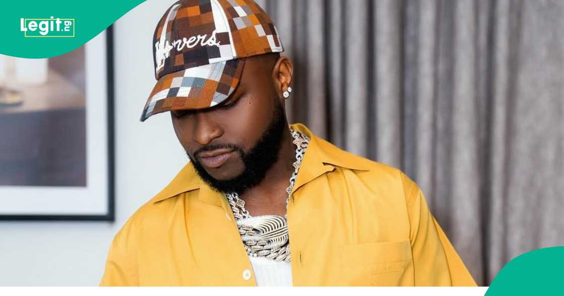 Fans react as Davido finally gives Ananzo his $5K. Fans react as Davido finally gives Ananzo his $5K.