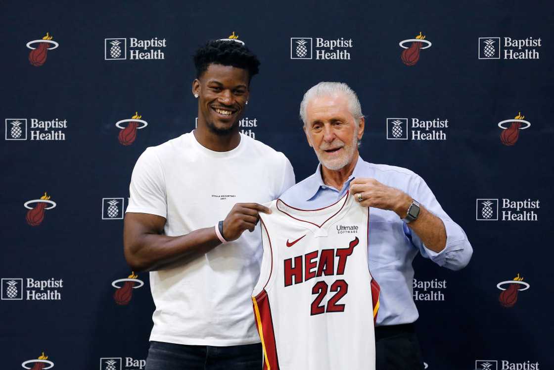 Jimmy Butler of the Miami Heat poses for a photo with president Pat Riley