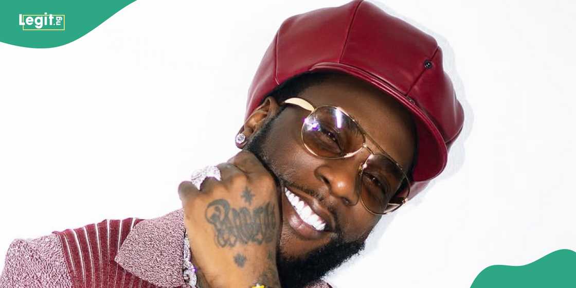 Burna Boy trends over security guard's behavour. Burna Boy trends over security guard's behavour.