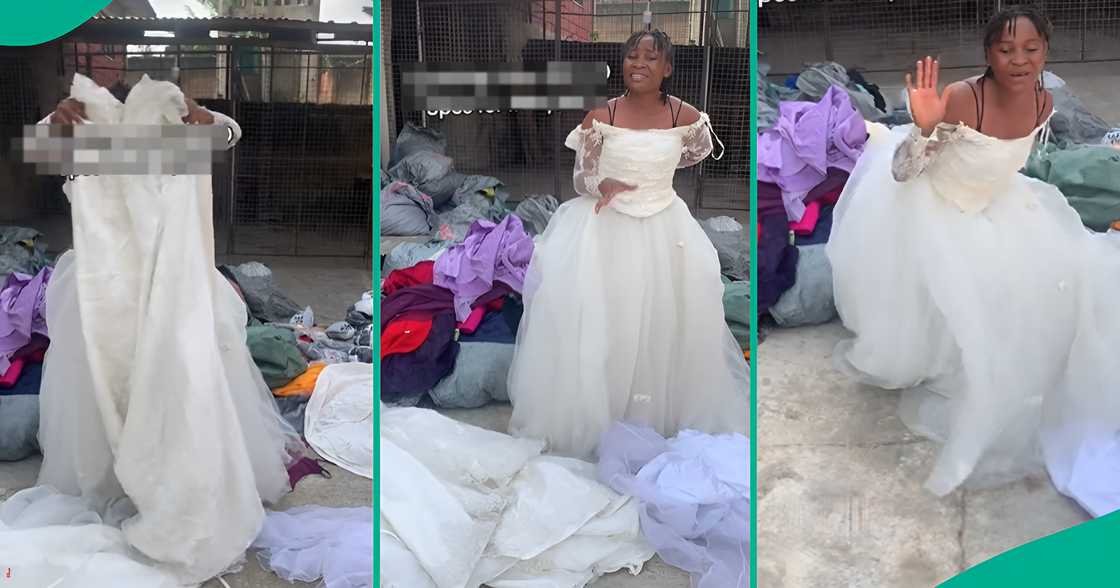A Nigerian thrift seller excitedly mentions the price of okrika wedding gown she sells in Ibadan, Oyo state. A Nigerian thrift seller excitedly mentions the price of okrika wedding gown she sells in Ibadan, Oyo state.