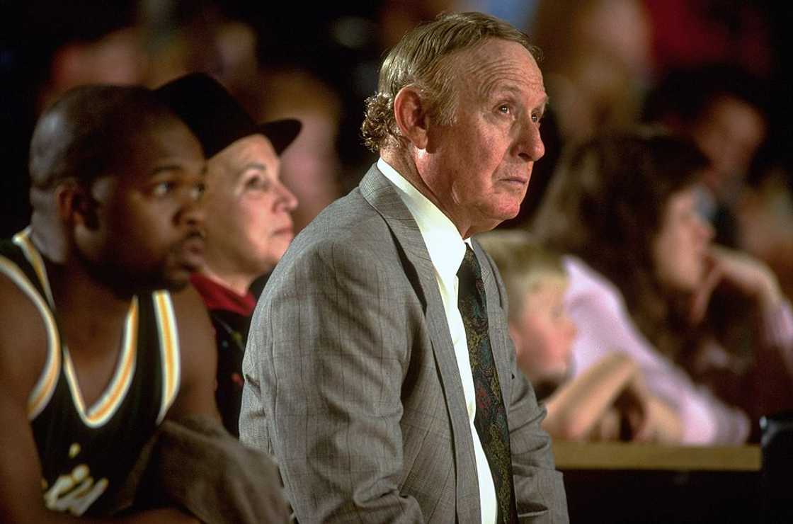 Red Klotz keenly looks on during a basketball game