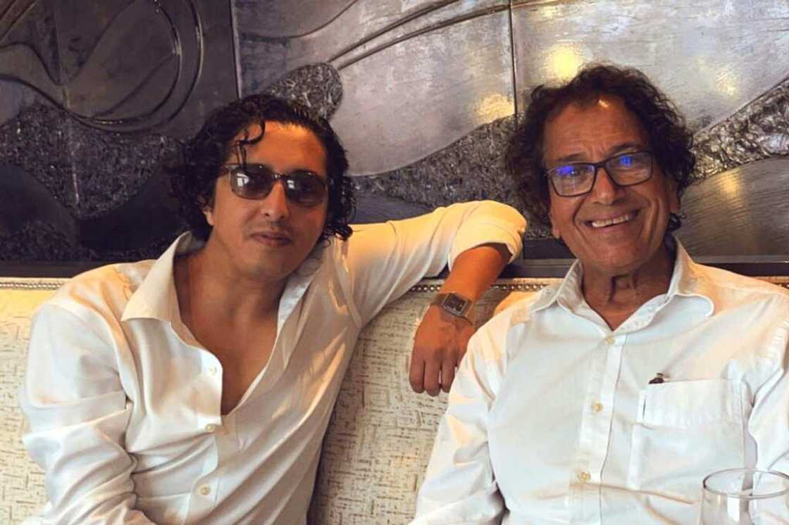 Ibrahim Almadi (L), poses for a picture with his father, Saad, at a vacation resort in Florida on June 20, 2021 Ibrahim Almadi (L), poses for a picture with his father, Saad, at a vacation resort in Florida on June 20, 2021