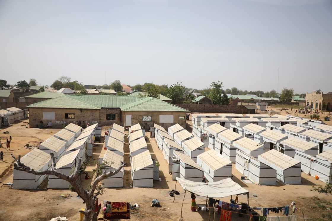 Aerial view of rows of white tents at a camp for internally displaced people in Anka, near Gusau, Zamfara State, 2019