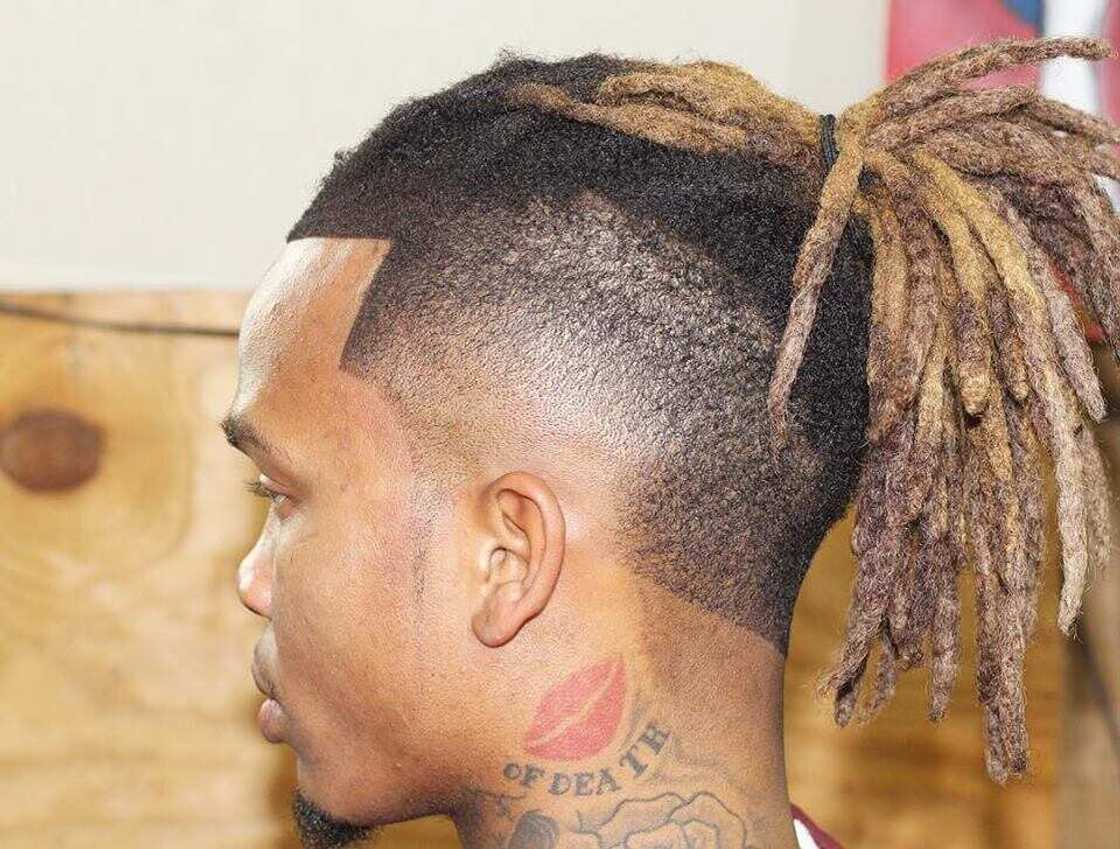 Dread ponytail with fade Dread ponytail with fade