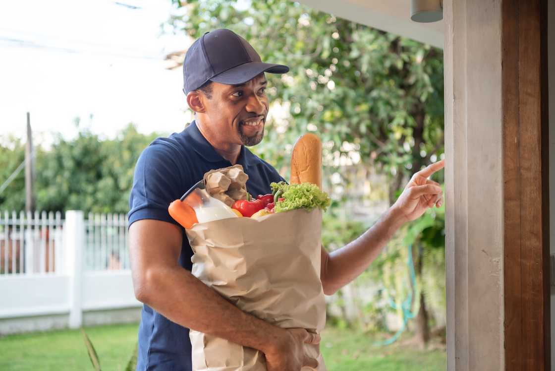 A man carrying groceries