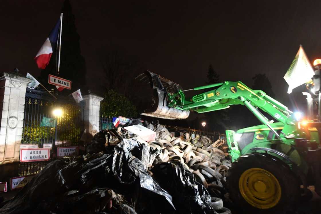 Farmers dumped tyres outside a regional authority to protest against the EU-Mercosur trade accord