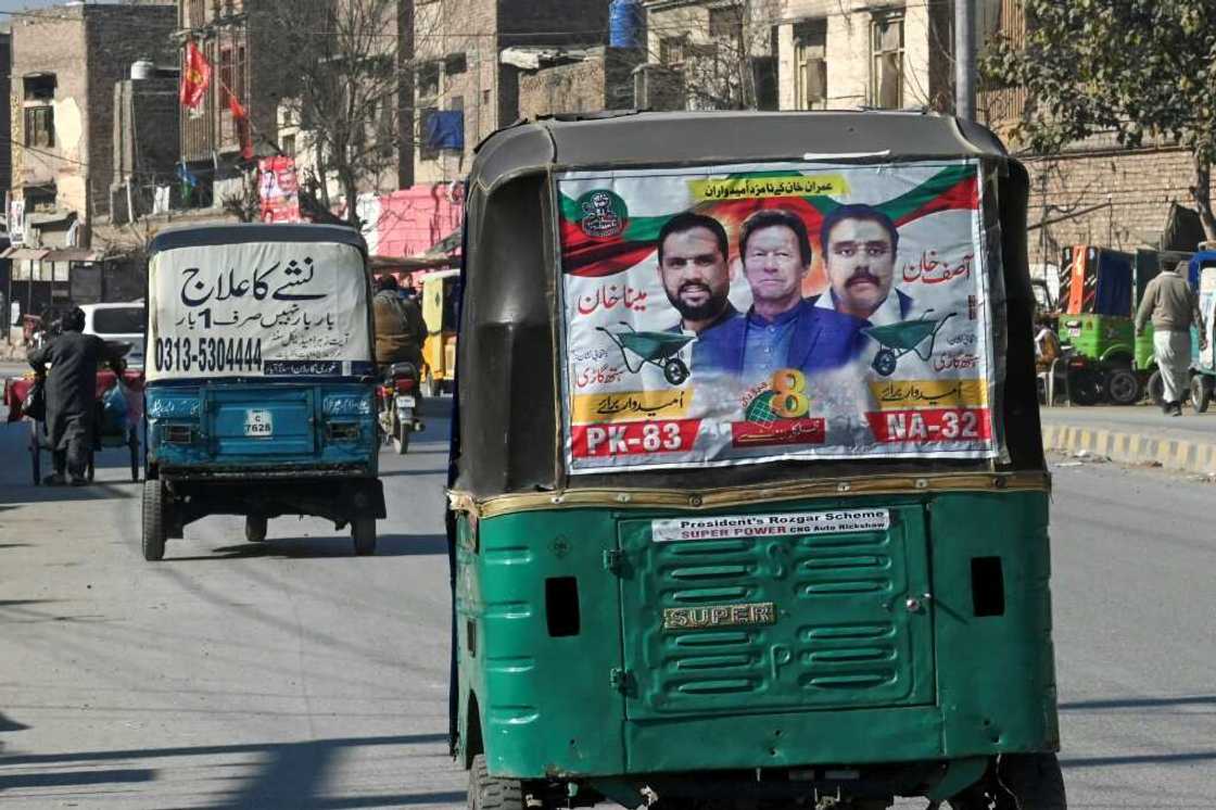 An autorickshaw with a party poster for jailed former prime minister Imran Khan in Peshawar, a day after Pakistan's election An autorickshaw with a party poster for jailed former prime minister Imran Khan in Peshawar, a day after Pakistan's election
