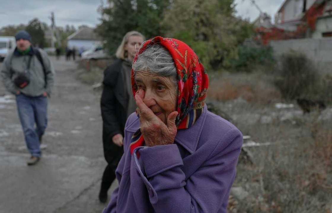 A weeping woman in Mykolaiv, Ukraine, on October 23, 2022 A weeping woman in Mykolaiv, Ukraine, on October 23, 2022