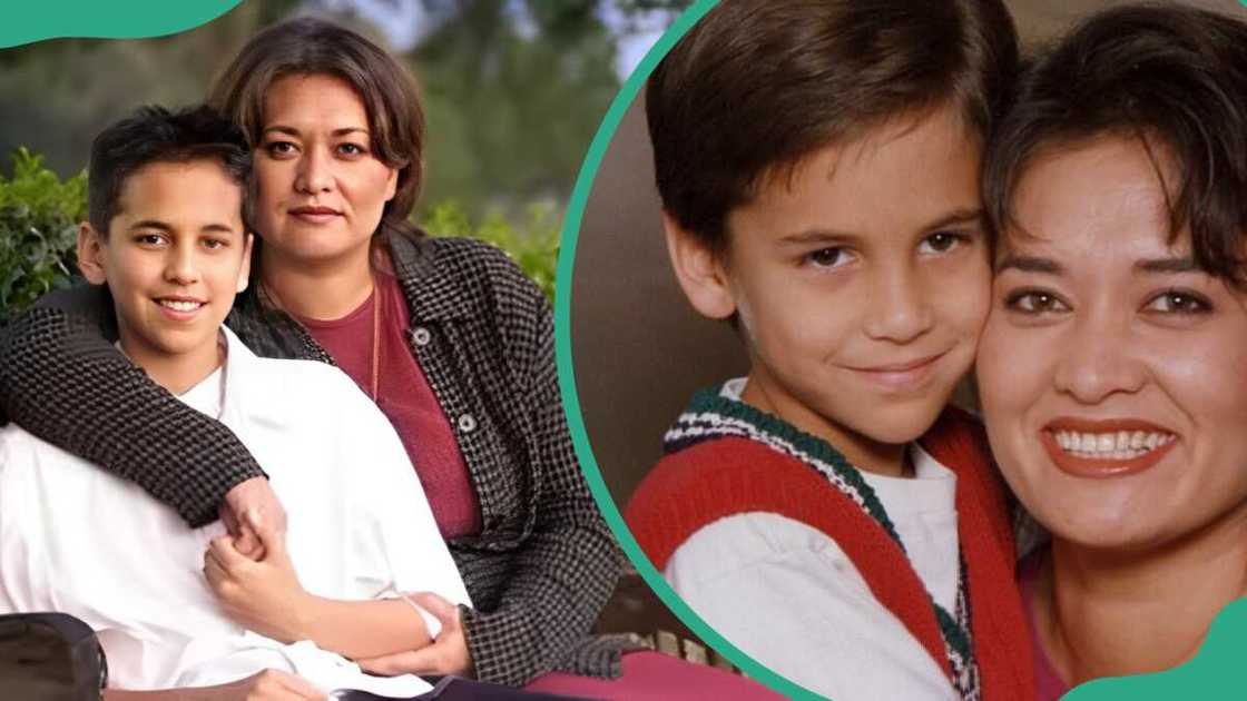 Katherine posing for a photo with her son Jonathan holding her. Katherine posing for a photo with her son Jonathan holding her.