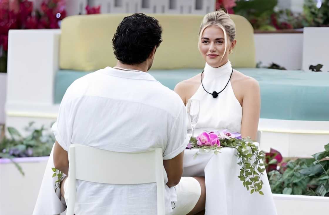 Carmen Kocourek and Kenzo Nudo sit during a date