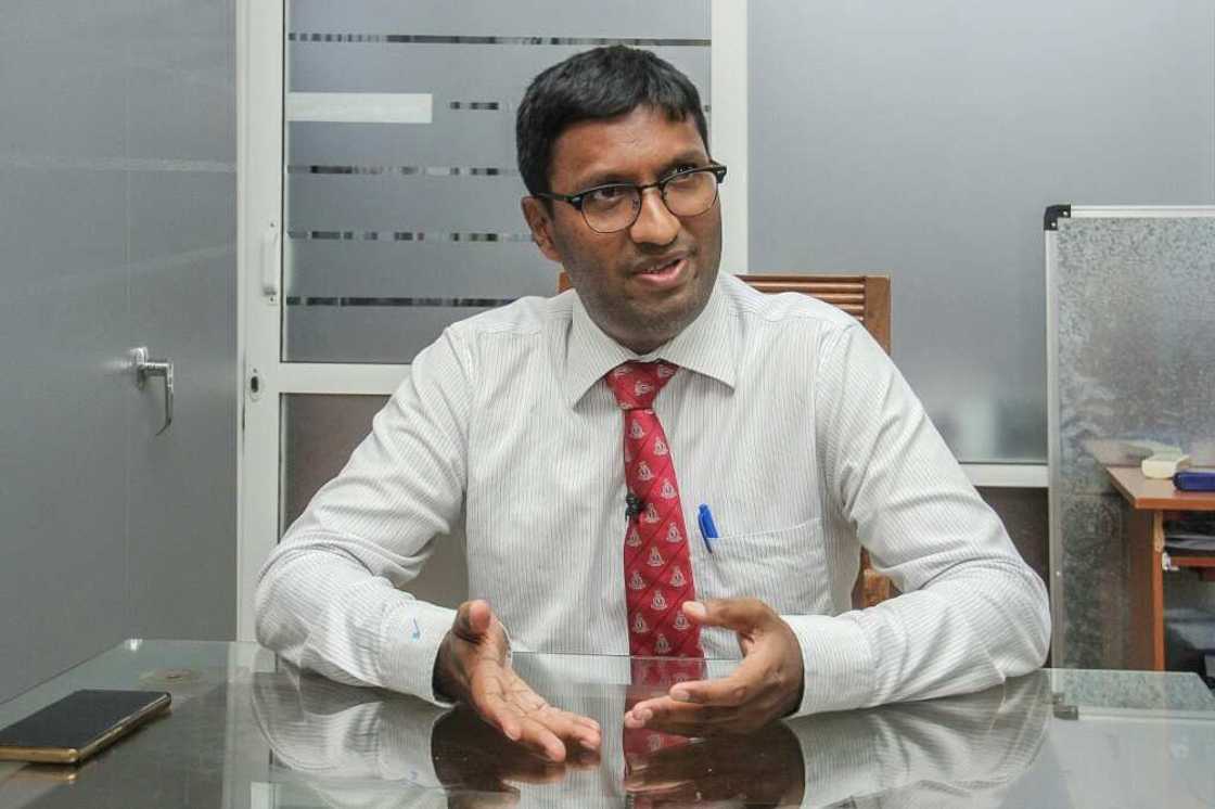 Dr Vasan Ratnasingham told AFP medical staff are being forced to work double shifts because their colleagues cannot report for duty Dr Vasan Ratnasingham told AFP medical staff are being forced to work double shifts because their colleagues cannot report for duty