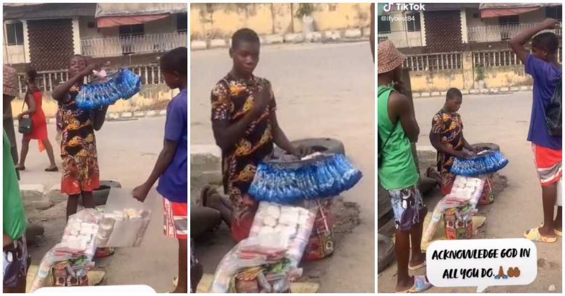 Young hawker, Nigerian kid hawking prays, hawker prays on the road, video of hawker praying Young hawker, Nigerian kid hawking prays, hawker prays on the road, video of hawker praying