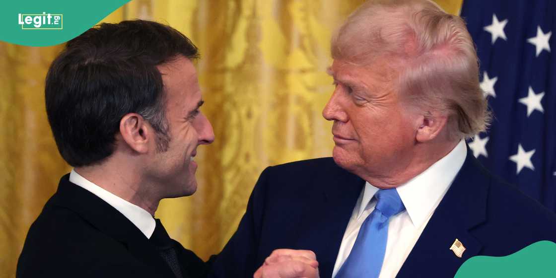 Trump shakes hands with Emmanuel Macron