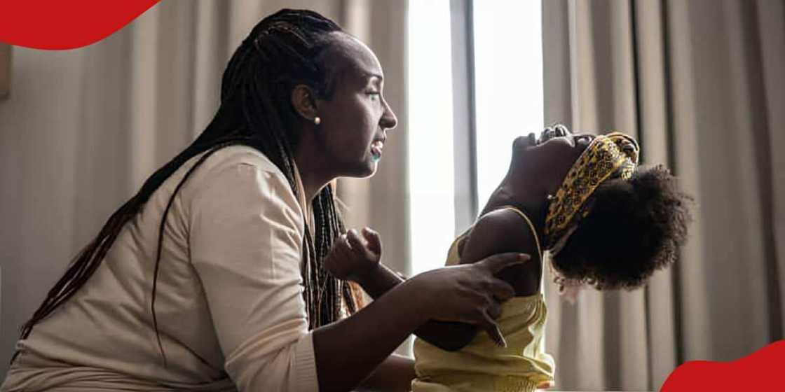 Photo of a mother playing with her baby. Photo of a mother playing with her baby.