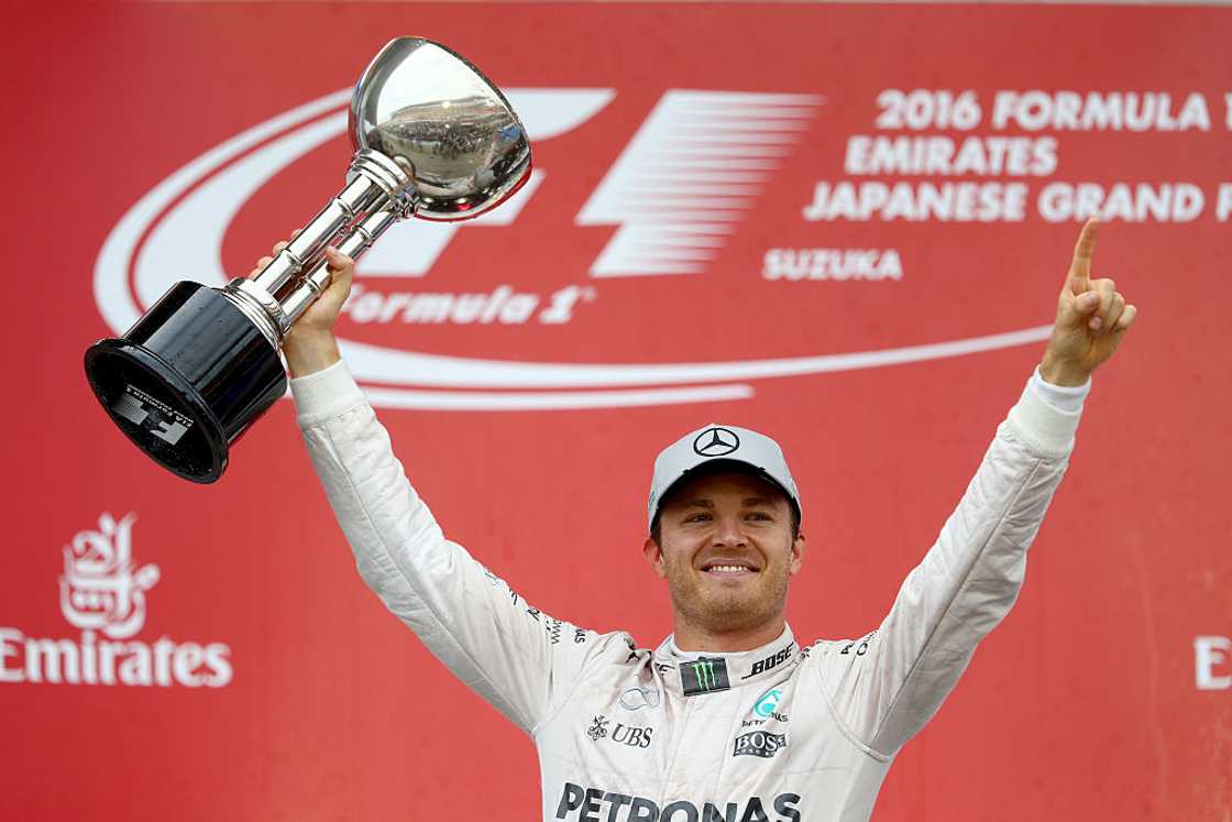 Nico Rosberg and Mercedes GP celebrate his win on the podium during the Formula One Grand Prix of Japan Nico Rosberg and Mercedes GP celebrate his win on the podium during the Formula One Grand Prix of Japan