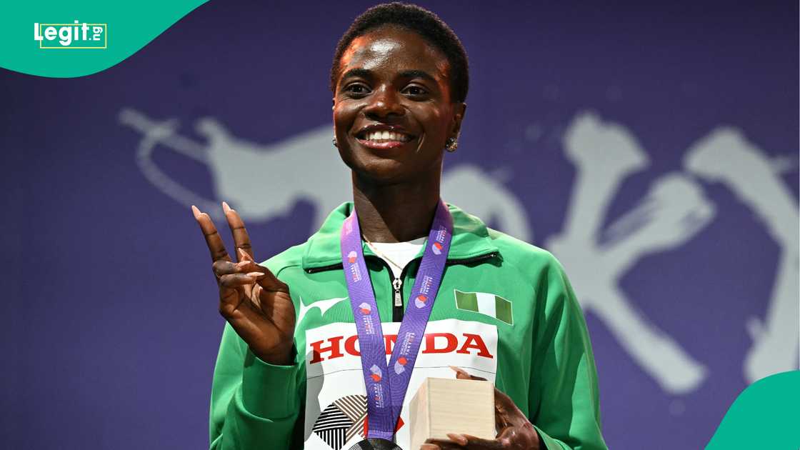 Silver medallist Tobi Amusan poses with her medal at the 2025 World Athletics Championships in Tokyo. Photo by PHILIP FONG Silver medallist Tobi Amusan poses with her medal at the 2025 World Athletics Championships in Tokyo. Photo by PHILIP FONG