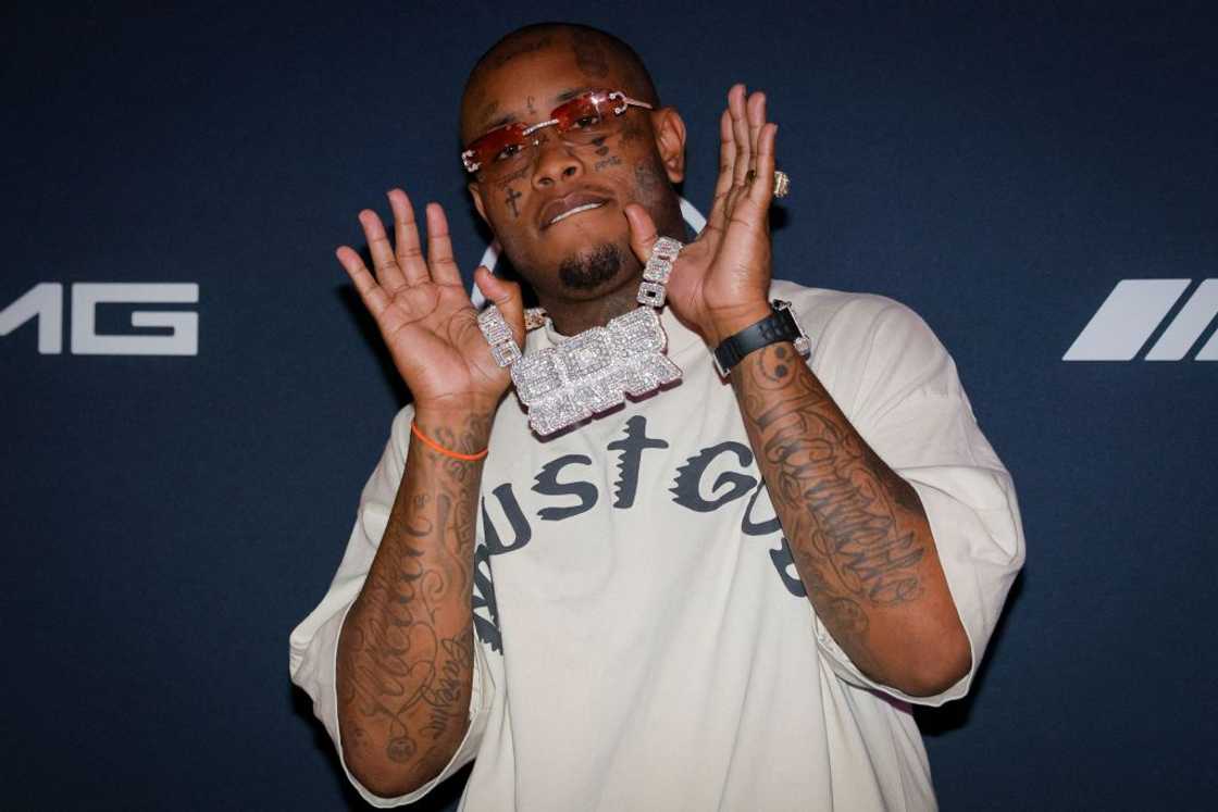 Southside shows off his bling at the Mercedes-AMG Brand Center Experience