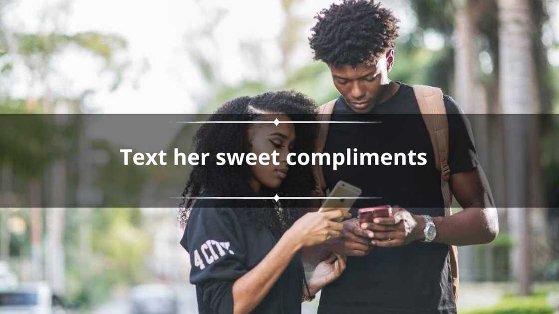 A man and a woman are checking their phones. A man and a woman are checking their phones.