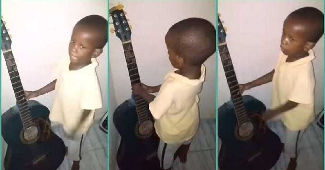 Little boy sings with melodious voice, plays guitar in video Little boy sings with melodious voice, plays guitar in video