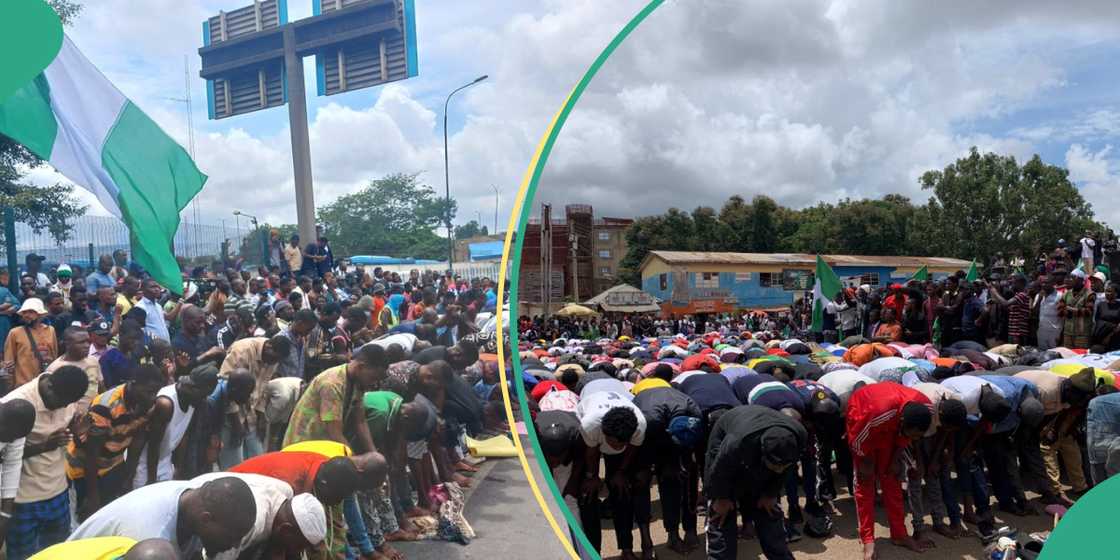 Muslim protesters pause protest to observe Friday prayer in Lagos