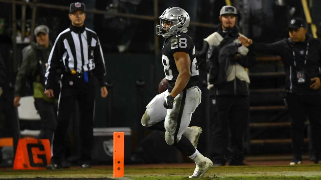 Doug Martin of the Oakland Raiders carries the ball for a 24 yard touchdown run