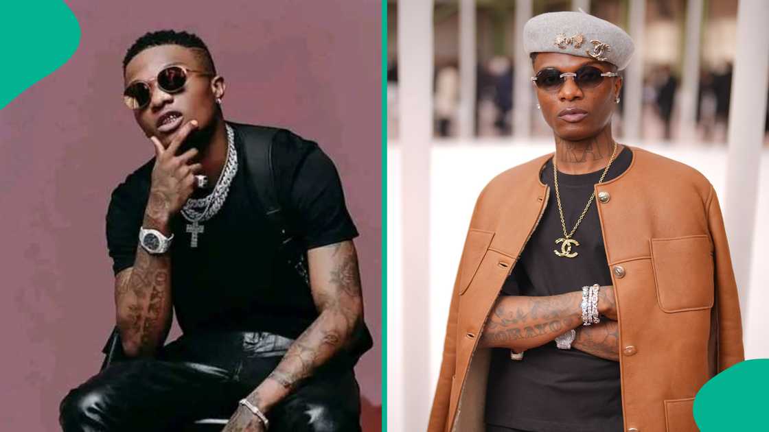 A barber rejoices after giving Wizkid a haircut A barber rejoices after giving Wizkid a haircut