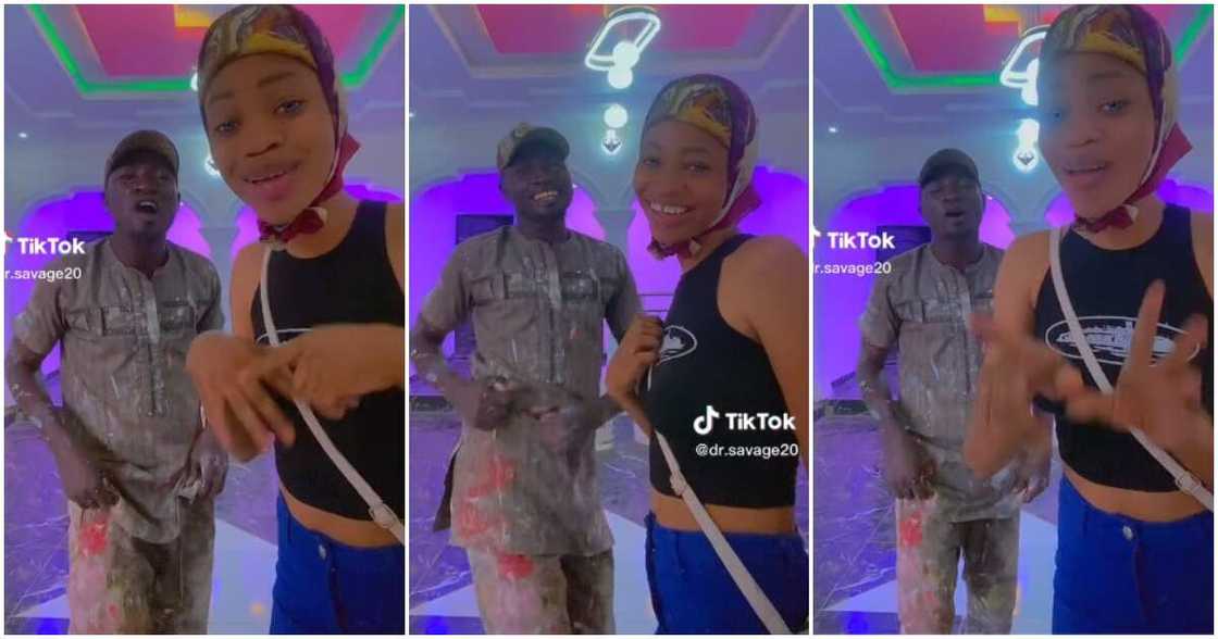 Funny house painter, lady dances with house painter Funny house painter, lady dances with house painter