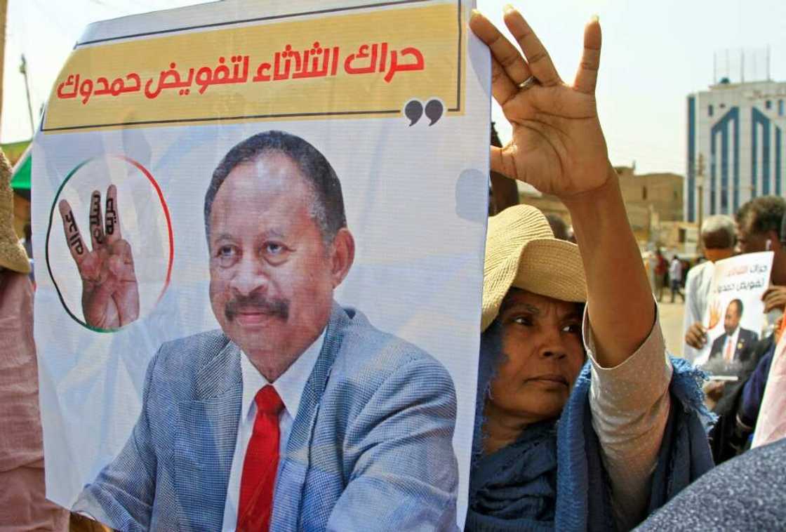 Sudanese protesters supported the reinstatement of Abdalla Hamdok, the premier ousted in the October 2021 military coup, during a demonstration in southern Khartoum on July 26, 2022 Sudanese protesters supported the reinstatement of Abdalla Hamdok, the premier ousted in the October 2021 military coup, during a demonstration in southern Khartoum on July 26, 2022