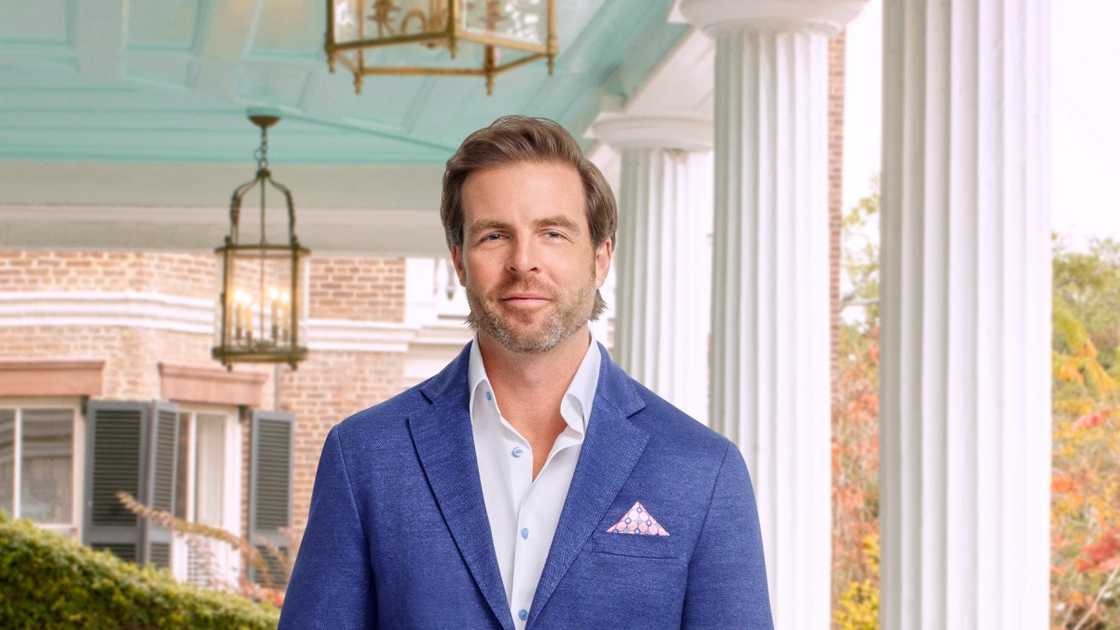 Jarrett Thomas poses standing for an outdoors Season 10 portrait Jarrett Thomas poses standing for an outdoors Season 10 portrait