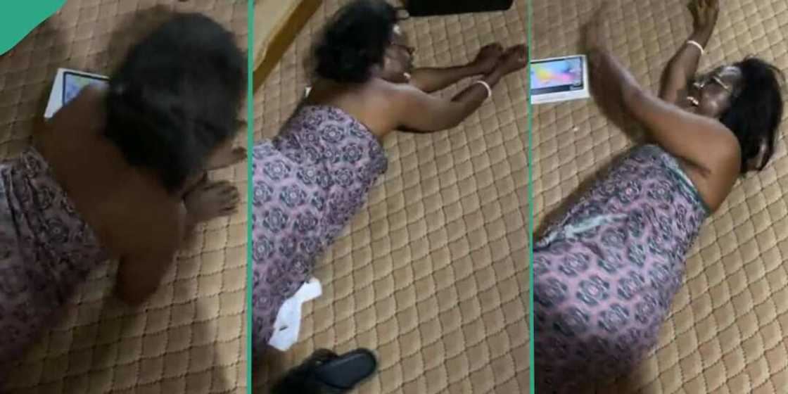 Woman's priceless reaction as son gifts her a tab Woman's priceless reaction as son gifts her a tab